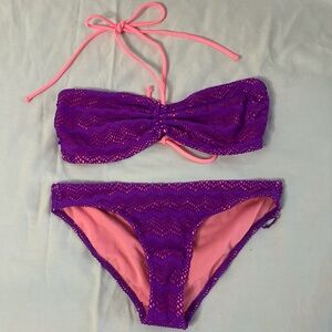 Pink and purple swimsuit set.
